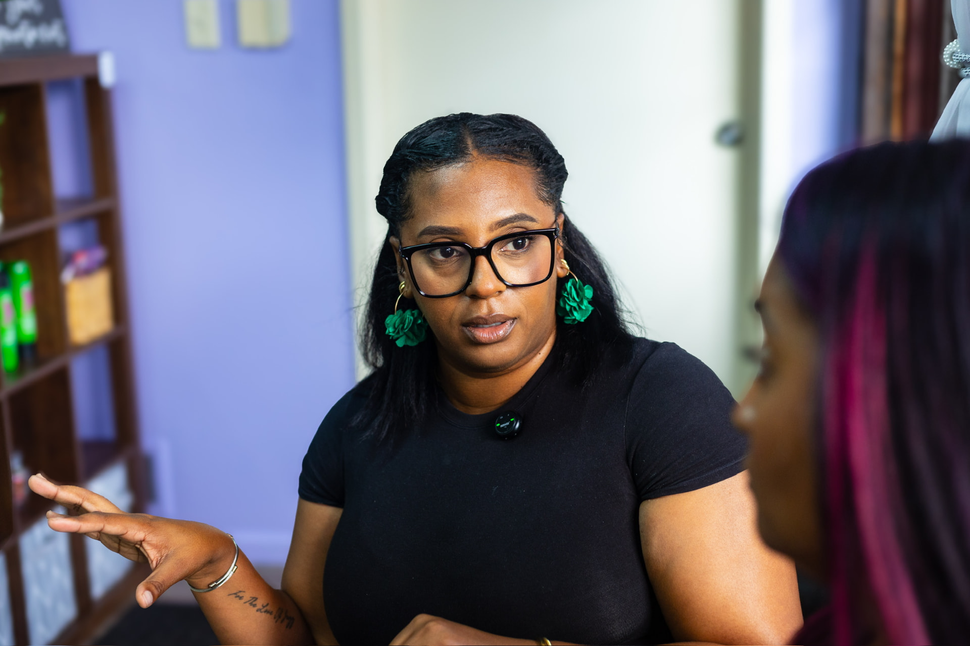 Danielle of YellOutLoud Creative talking strategy with a client